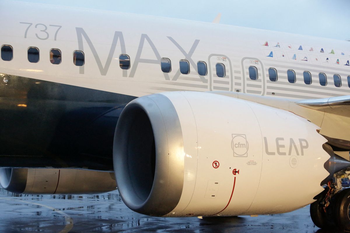 -CFM International LEAP-1B engines are pictured on Boeings first 737 MAX named the "Spirit of Renton" parked on the tarmac at the Boeing factory in Renton, Washington on December 8, 2015. The latest version of Boeing's best-selling 737, introduced in the mid-1960s, is due to make its first flight early next year and reach customers in 2017. It will burn an estimated 14 percent less fuel per seat than current 737s and fly farther, allowing airlines to open new routes. AFP PHOTO/JASON REDMOND (Photo by JASON REDMOND / AFP)