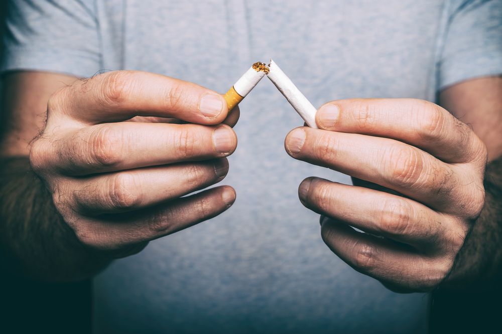 Quit,Smoking,-,Male,Hand,Crushing,Cigarette