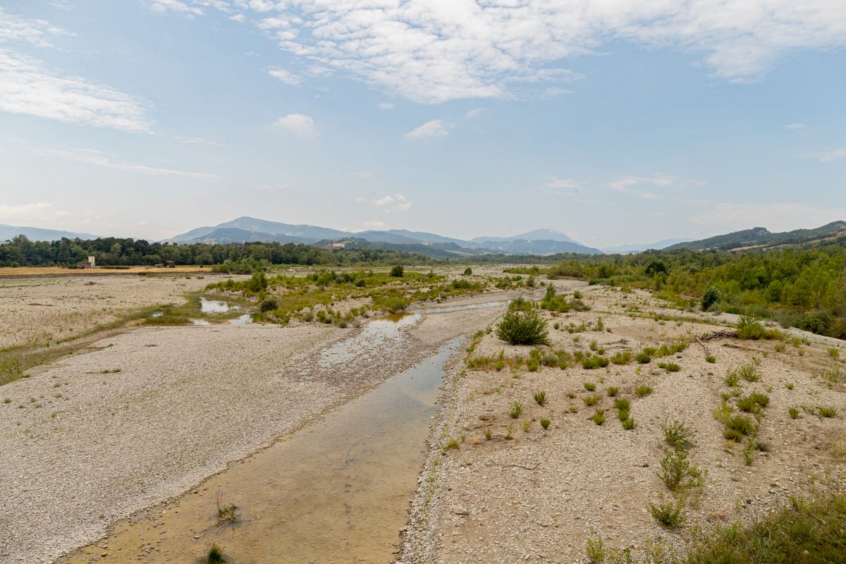 Drought In The North Of Italy: Low Level Of The Taro River Fornovo, Italy. 7 August 2022. Northern Italy is battling its worst drought in 70 years, with the government recently declaring a state of emergency in five regions due to a lack of rain and sweltering temperatures In the picture: the almost empty bed of the Taro river, a tributary of the Po river, near Fornovo, in Emilia Romagna. (Photo by Stefano Nicoli/NurPhoto) (Photo by Stefano Nicoli / NurPhoto / NurPhoto via AFP)