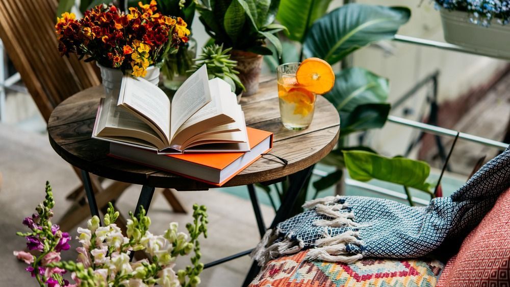 Reading,Books,In,Summer,At,A,Beautiful,Terrace,Or,Cozy