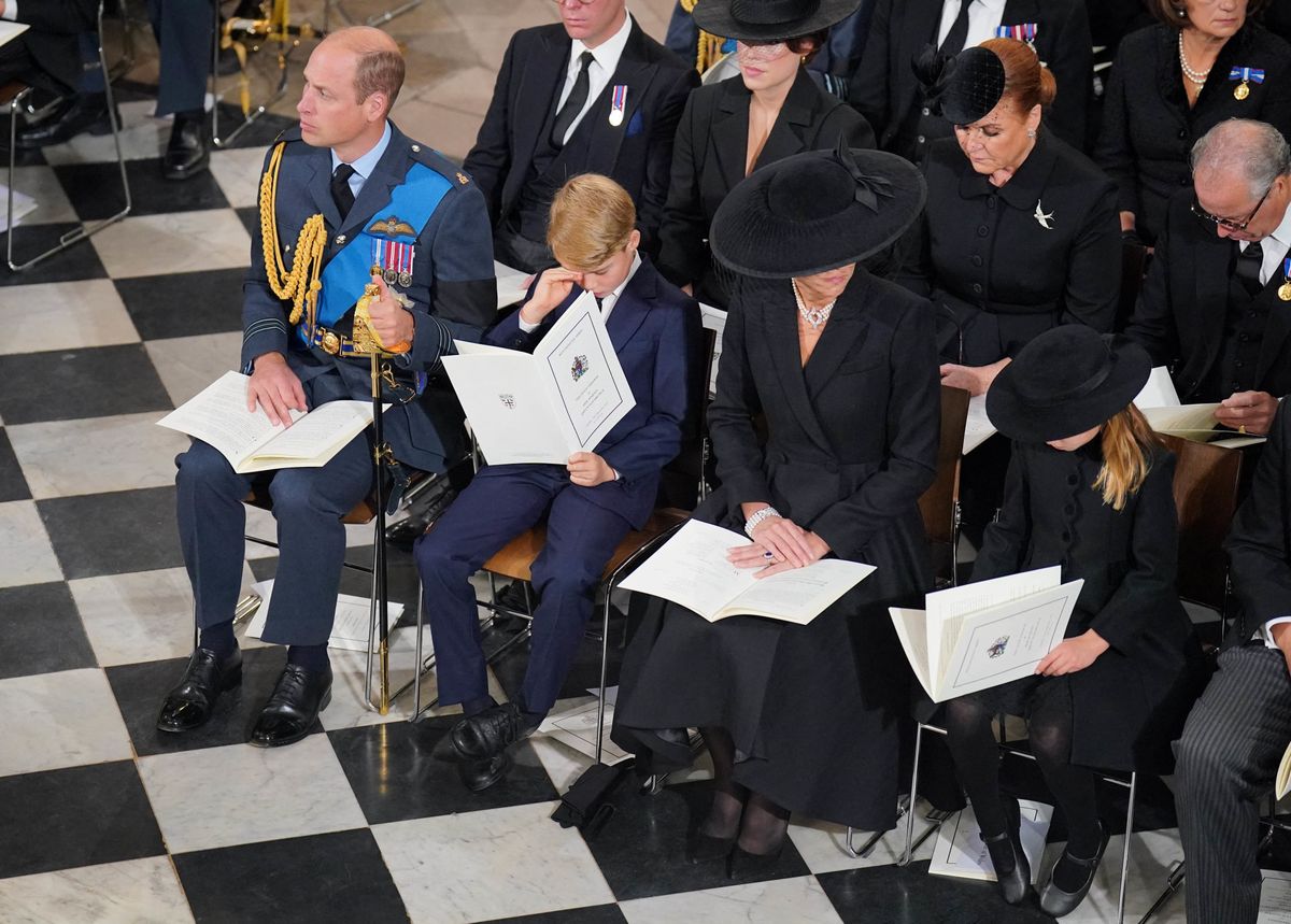 Britain's Prince William, Prince of Wales, Britain's Catherine, Princess of Wales with Prince George and Princess Charlotte attend the State Funeral Service for Britain's Queen Elizabeth II, at Westminster Abbey in London on September 19, 2022. - Leaders from around the world will attend the state funeral of Queen Elizabeth II. The country's longest-serving monarch, who died aged 96 after 70 years on the throne, will be honoured with a state funeral on Monday morning at Westminster Abbey. (Photo by Dominic Lipinski / POOL / AFP)