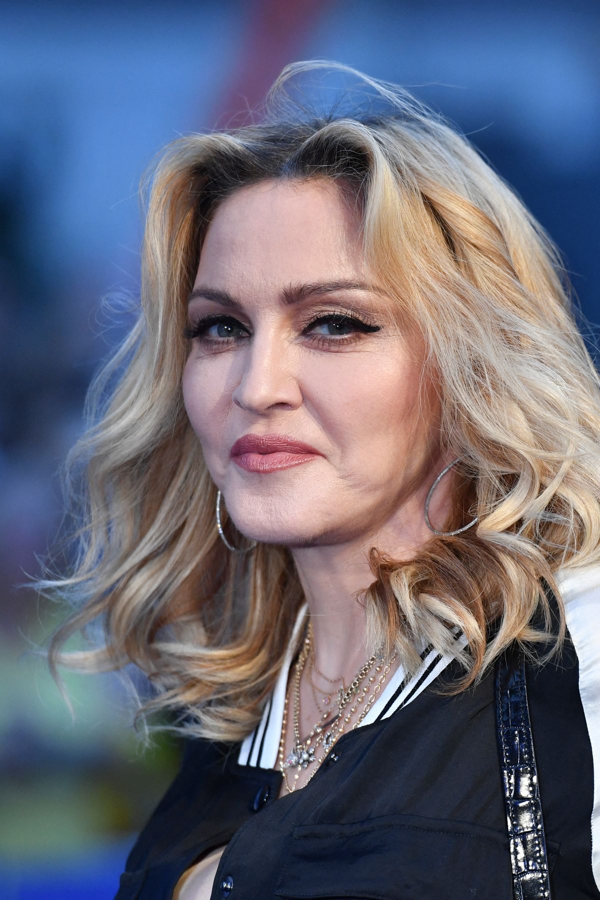 US singer-songwriter Madonna poses arriving on the carpet to attend a special screening of the film "The Beatles Eight Days A Week: The Touring Years" in London on September 15, 2016. (Photo by Ben STANSALL / AFP)