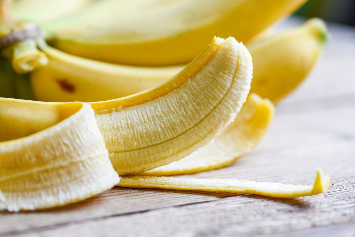 Banana,Peel,On,Wooden,Background,,Close,Up,Ripe,Banana,Peel