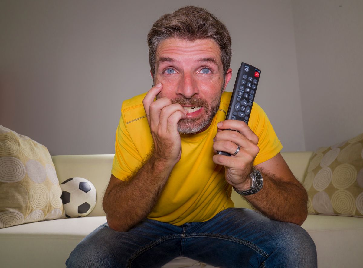 Close,Up,Expressive,Portrait,Of,Young,Excited,And,Nervous,Football