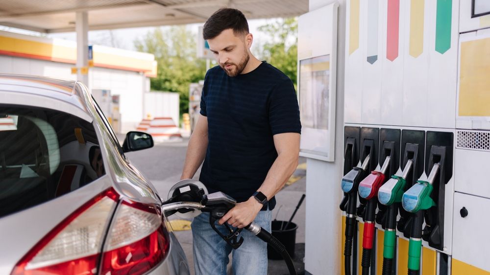 Handsome,Young,Man,Refueling,Car,At,Gas,Station.,Petrol,Concept.