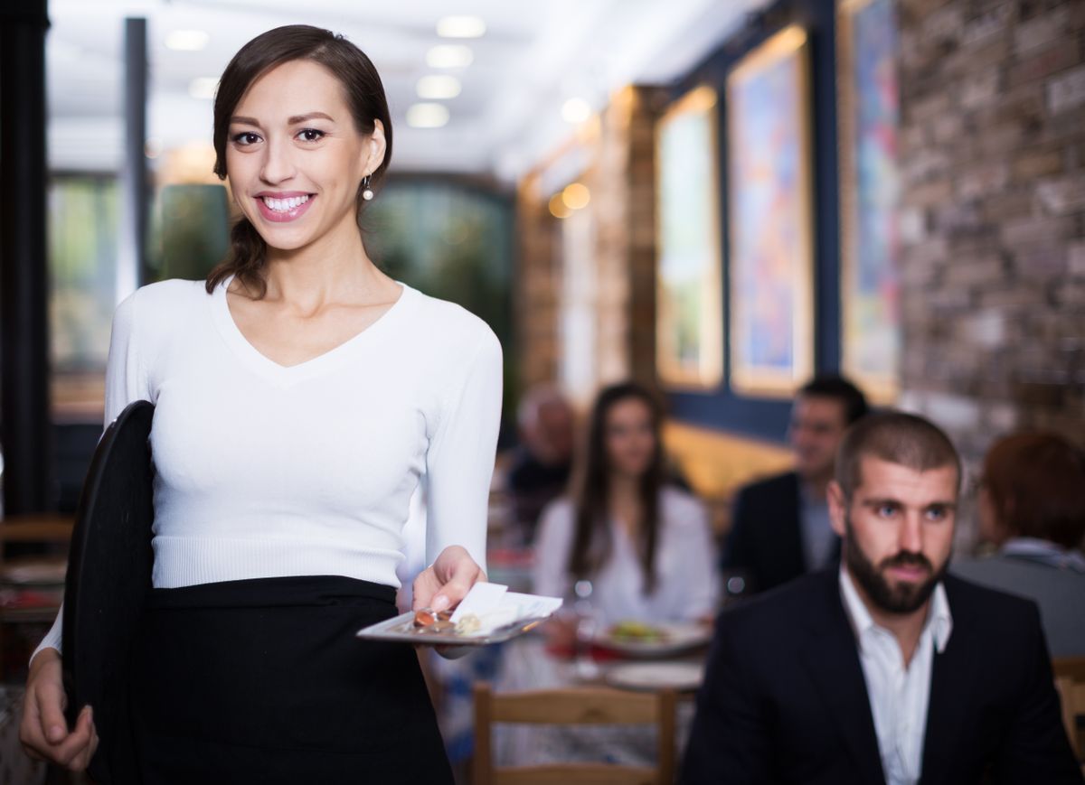 Portrait,Of,Employee,Waitress,With,Serving,Tray,With,Tips,Indoors