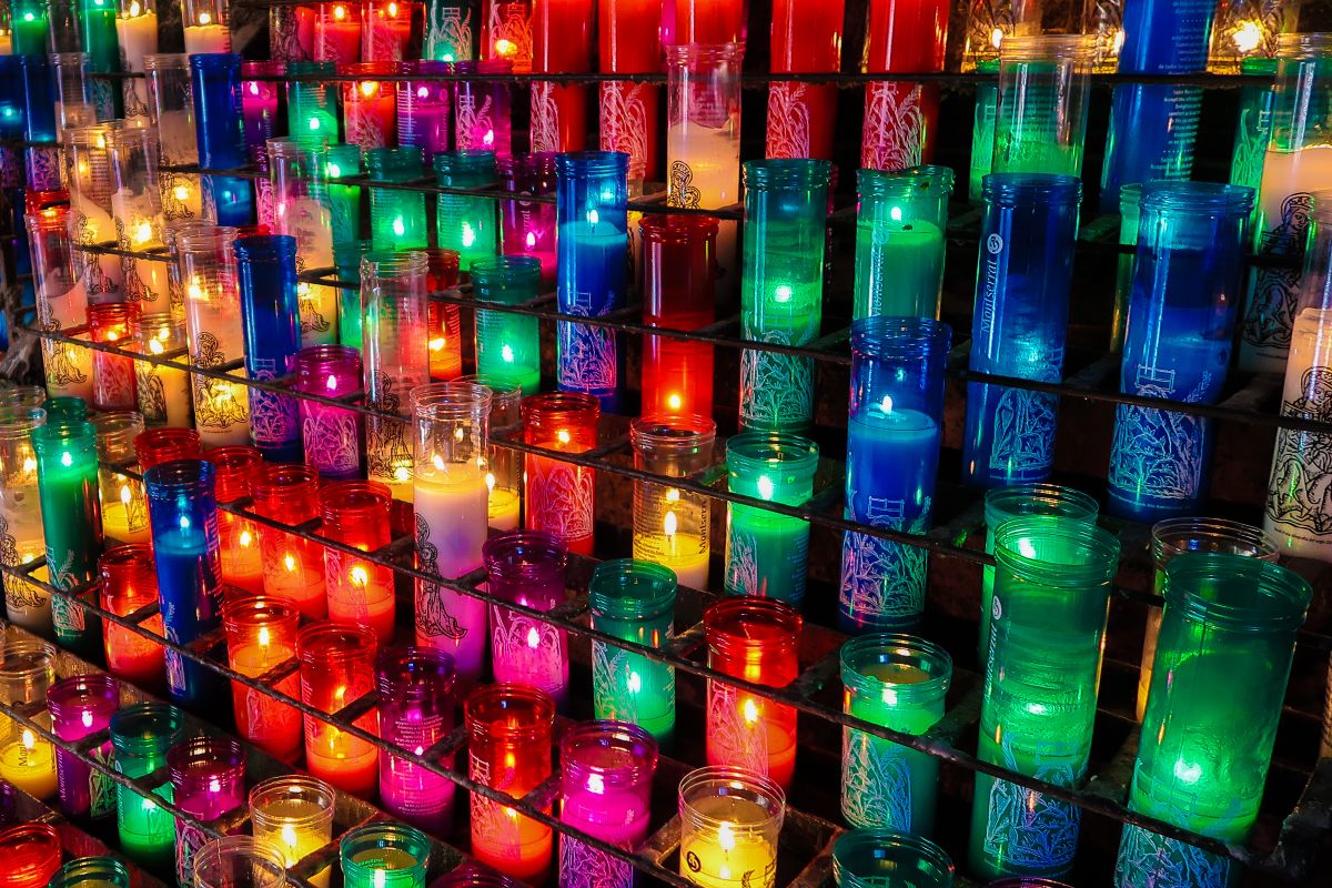 Colorful,Candles,For,Prayer,In,The,Quite,Walls,Of,Montserrat