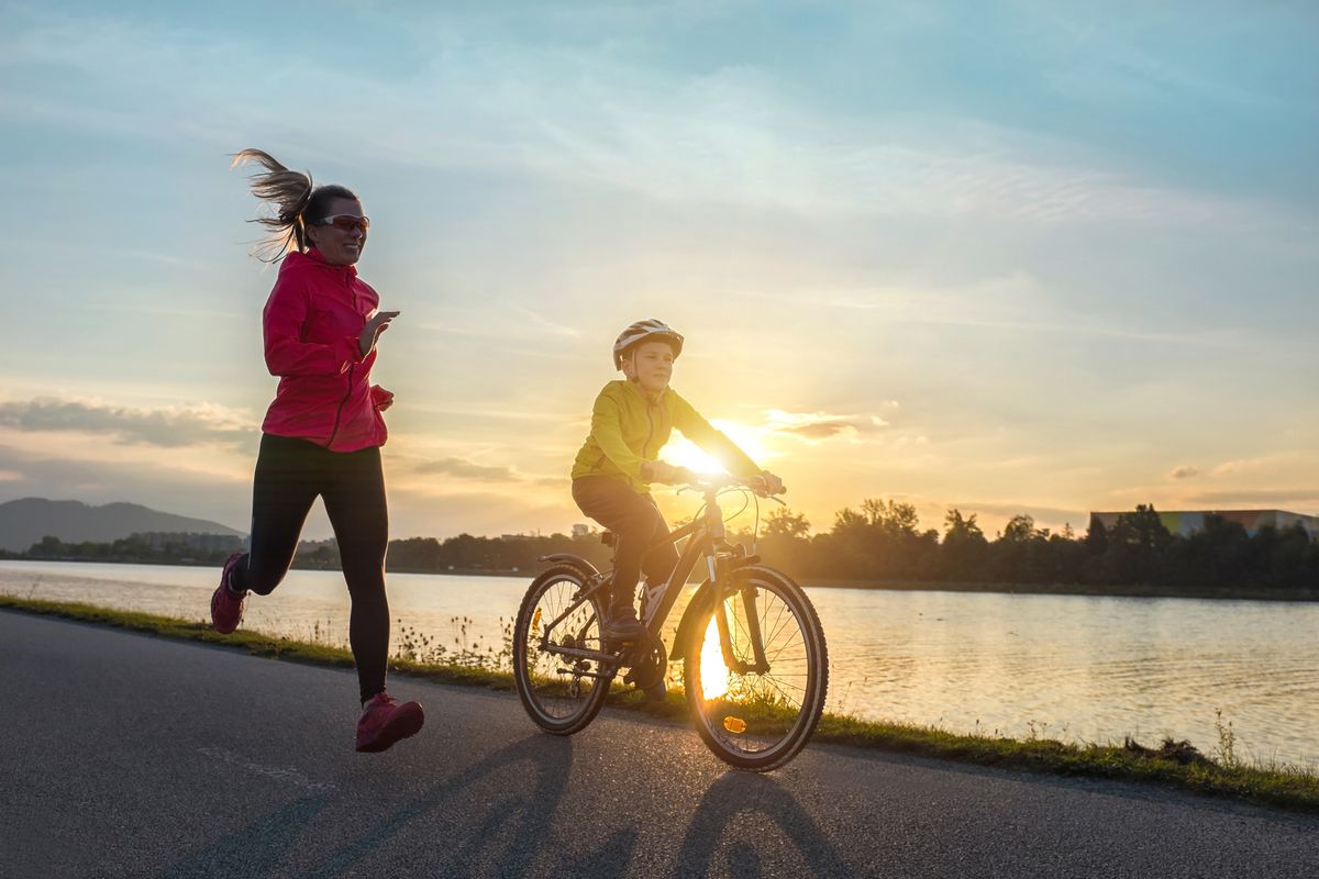 Happy,Mother,And,Son,Go,In,Sports,Outdoors.,Boy,Rides