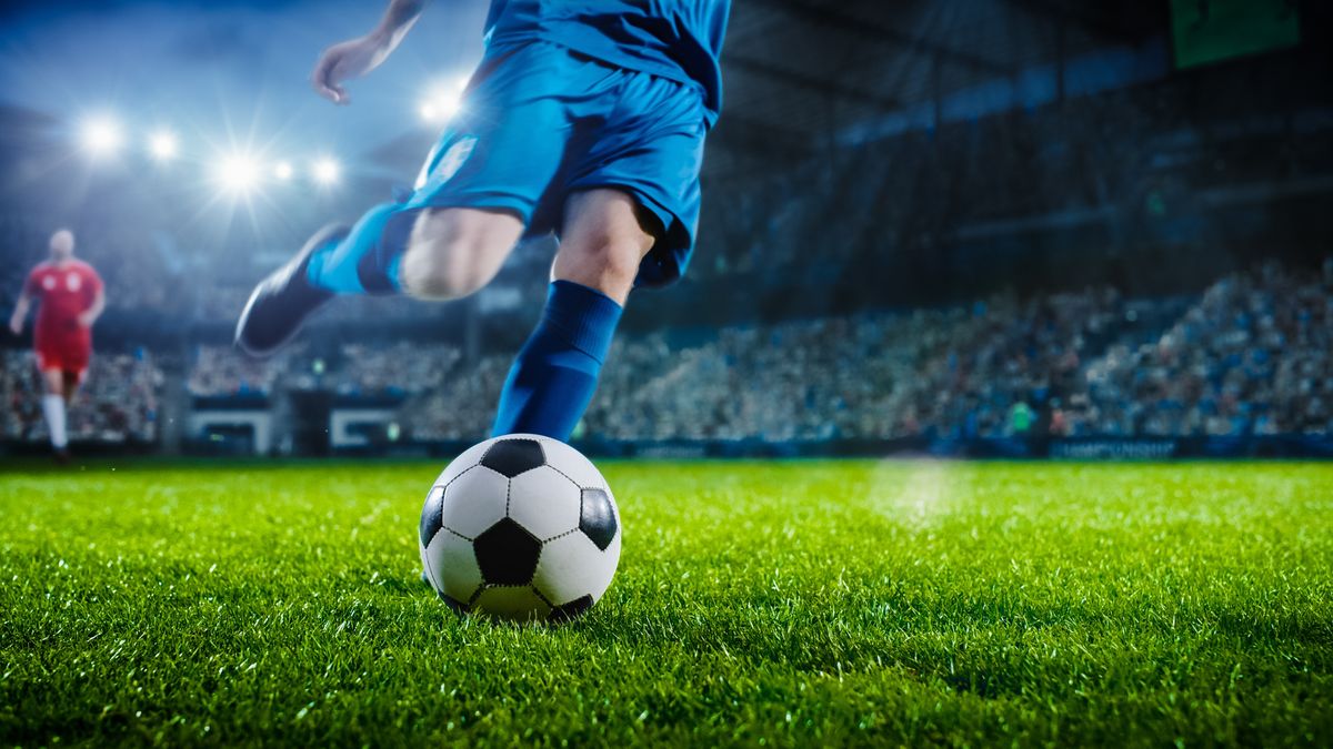 Football,World,Championship:,Soccer,Player,Runs,To,Kick,The,Ball.