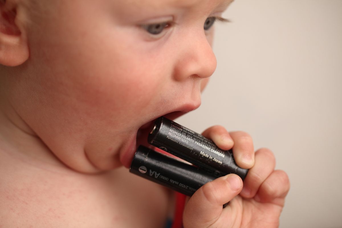Toddler,Baby,Will,Try,The,Batteries,In,His,Mouth.,Belarus,minsk,2019.